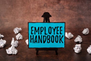 İlham verici Çalışan El Kitabı 'nı gösteren bir metin. Yeni Parlak Fikirler Düşünen Şirketlerin işletme prosedürlerini içeren bir iş fikri belgesi Yaratıcılık ve İlham Yenileme