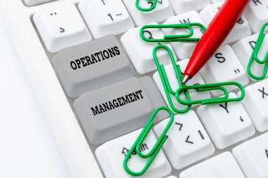 İşlem Yönetimini gösteren metin işareti. İş genel görünümü Üretim ve Tedarik Programcısının Antivirüs Kodları Yazması, Hata Ayıklama Kodlarının yeniden yazılması için girdilerin sağlanmasını sağlar