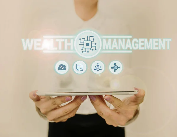 Text sign showing Wealth Management. Business overview Sustain and grow long term prosperity Financial care Lady In Uniform Standing Holding Tablet Showing Futuristic Technologies. — Foto Stock