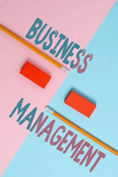 Inspiration showing sign Business Management. Business showcase Overseeing Supervising Coordinating Business Operations Two Objects Arranged Facing Inward Outward On a Separated Coloured Background — Stockfoto