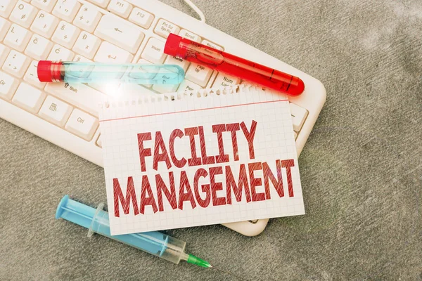 Inspiration showing sign Facility Management. Concept meaning Multiple Function Discipline Environmental Maintenance Typing Medical Notes Scientific Studies And Treatment Plans — Stockfoto