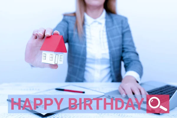 Text sign showing Happy Birthday. Business overview The birth anniversary of a person is celebrated with presents A Young Lady Orbusiness-Woman Calculating Orsigning Loans Ormortagages Orexpences — Stock Photo, Image