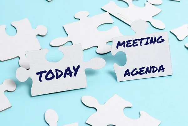 Conceptual display Meeting Agenda. Internet Concept An agenda sets clear expectations for what needs to a meeting Building An Unfinished White Jigsaw Pattern Puzzle With Missing Last Piece — Stockfoto