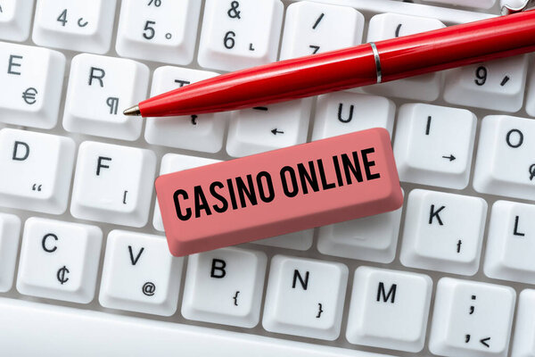 Writing displaying text Casino Online. Internet Concept Computer Poker Game Gamble Royal Bet Lotto High Stakes Downloading Online Files And Data, Uploading Programming Codes