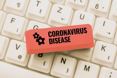 Coronavirus Hastalığı metni yazılıyor. İnternet Konsepti, yeni bir virüs olan SARSCoV2 'nin İndirme Geçmişi Dosyalarını Yeniden İndirmesi, Çevrimiçi Kayıt Formlarını Yazması sonucu oluşan bir hastalık olarak tanımlanır.