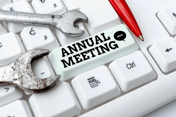 Text sign showing Annual Meeting. Business approach Yearly gathering of an organization interested shareholders Typing Device Instruction Manual, Posting Product Review Online