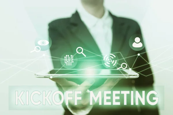 Sign displaying Kickoff Meeting. Business concept Special discussion on the legalities involved in the project Lady In Suit Presenting Mobile Device With Futuristic Interface Tech. — Stock Photo, Image