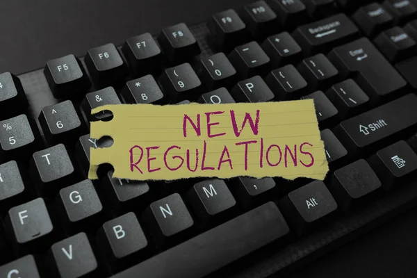 Text caption presenting New Regulations. Word Written on Regulation controlling the activity usually used by rules. Downloading Documents Concept, Uploading And Posting New Files To Internet — Fotografia de Stock