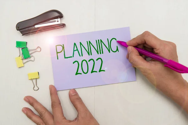 Writing displaying text Planning 2022. Word Written on Begin with end in the Mind Positioning Long term Objectives Flashy School Office Supplies, Teaching Learning Collections, Writing Tools, — 图库照片