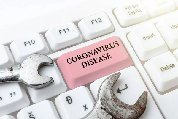 Написание текста Coronavirus Disease. Понятие означает заболевание, вызванное новым вирусом SARSCoV2 Создание нового руководства по программированию, напечатание исходных кодов программы — стоковое фото