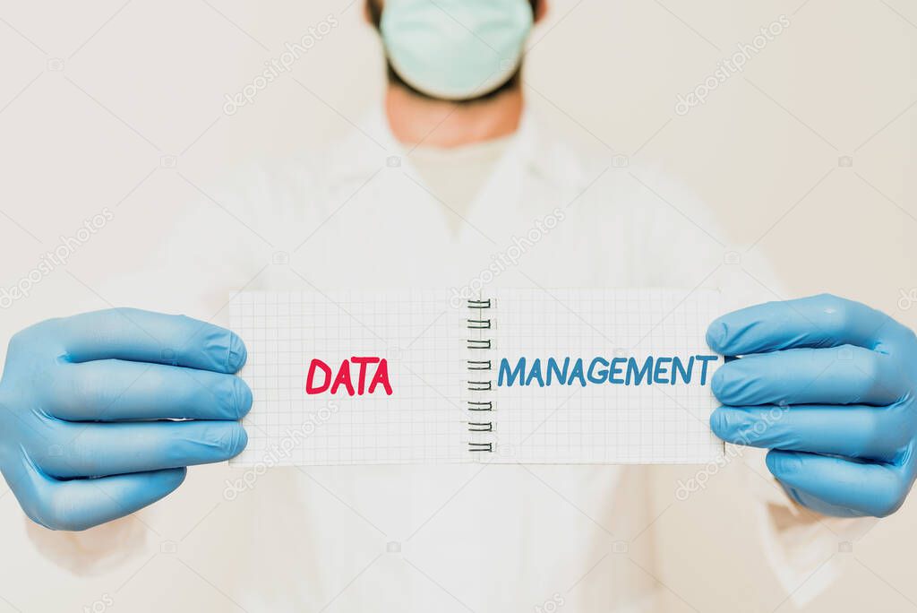 Text caption presenting Data Management. Business overview The practice of organizing and maintaining data processes Scientist Presenting New Research, Chemist Planning Advance Procedures