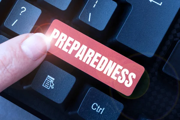 Hand writing sign Preparedness. Word Written on quality or state of being prepared in case of unexpected events Downloading Online Files And Data, Uploading Programming Codes — Stockfoto