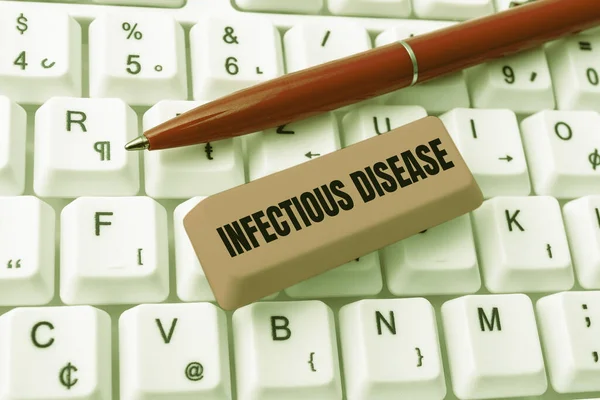 Text showing inspiration Infectious Disease. Concept meaning caused by pathogenic microorganism, such as viruses, and more Downloading Online Files And Data, Uploading Programming Codes — Stockfoto