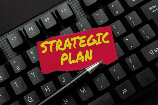 Conceptual caption Strategic Plan. Business approach A process of defining strategy and making decisions Transferring Written Notes To A Computer, Typing Motivational Messages — Stockfoto