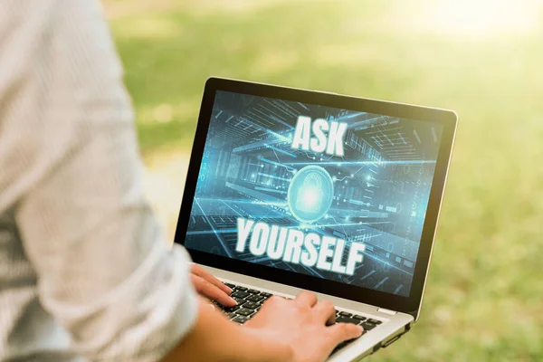 Text caption presenting Ask Yourself. Business concept Thinking the future Meaning and Purpose of Life Goals Woman Typing On Laptop In The Park Alone Accomplishing Remote Jobs. — Stockfoto