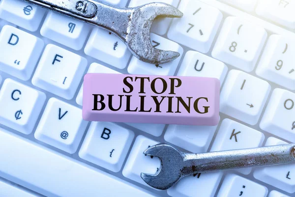 Conceptual caption Stop Bullying. Business idea Fight and Eliminate this Aggressive Unacceptable Behavior Typing Cooking Lesson Guidebook, Retyping New Online Guidelines — 图库照片