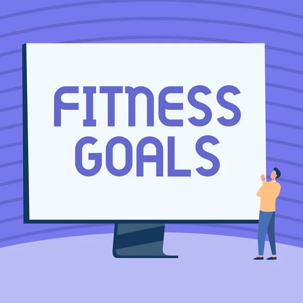 Handwriting text Fitness Goals. Business idea Loose fat Build muscle Getting stronger Conditioning Man Standing Drawing Looking At Large Monitor Display Showing News. — Stock Photo, Image