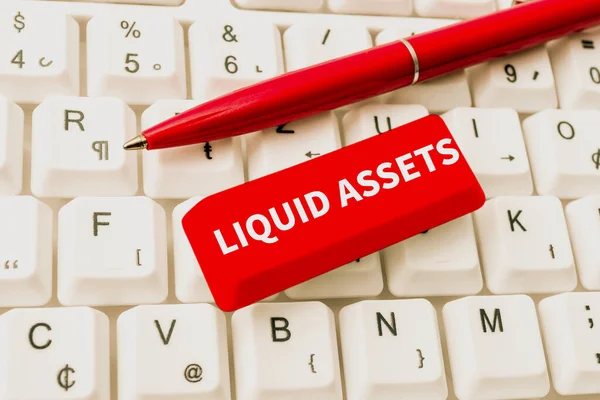 Liquid Assets 를 보여 주는 텍스트. Business concept Cash and Bank Balances Market Liquidity Deferred Stock Typing Product Ingredients, Abstract Presenting Upgraded Keyboard — 스톡 사진