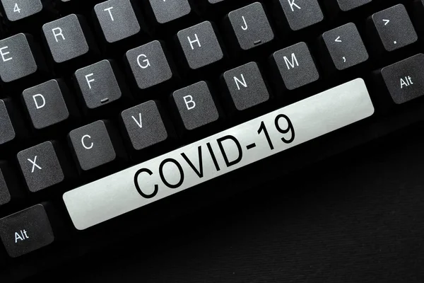Text sign showing Covid19. Business concept mild to severe respiratory illness that is caused by a coronavirus Typing New Educational Textbook, Abstract Retyping Old Essay Online — Stockfoto