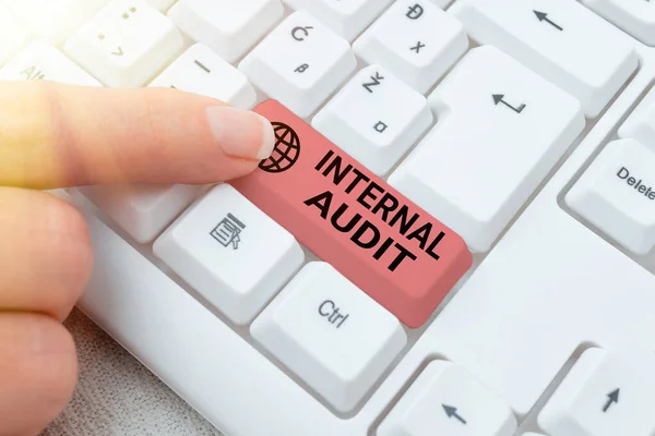 Sign displaying Internal Audit. Business concept evaluates the objective assurance to improve a firm s is operation Retyping Download History Files, Typing Online Registration Forms — Stock Photo, Image