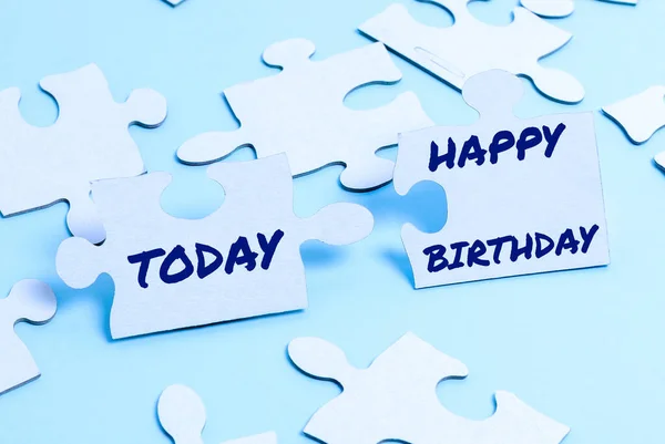 Hand writing sign Happy Birthday. Business idea The birth anniversary of a person is celebrated with presents Building An Unfinished White Jigsaw Pattern Puzzle With Missing Last Piece — Stock Photo, Image