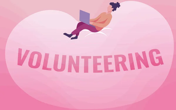 Text sign showing Volunteering. Business concept Provide services for no financial gain Willingly Oblige Lady Drawing Sitting Back On A Large Bean Bag Using Laptop. — Fotografia de Stock