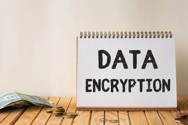 Conceptual display Data Encryption. Conceptual photo Symmetrickey algorithm for the encrypting electronic data Empty Open Spiral Notebook Beside Stockpile Of Coins On Top Of Desk. — Stock Photo, Image