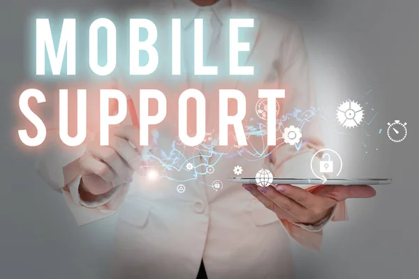 Text sign showing Mobile Support. Business approach Provides maintenance on portable devices technical issues Lady In Suit Holding Phone And Performing Futuristic Image Presentation. — Stockfoto