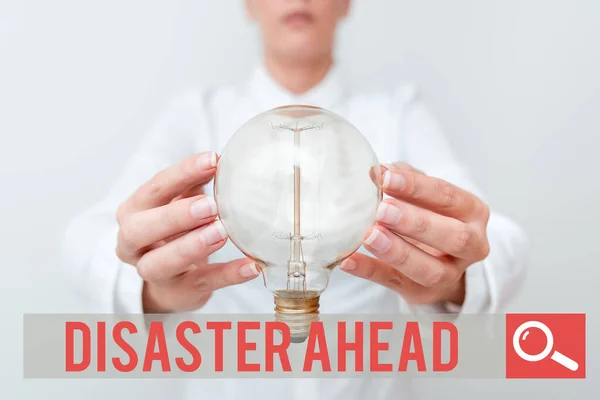 Handwriting text Disaster Ahead. Conceptual photo Contingency Planning Forecasting a disaster or incident Lady in outfit holding lamp with two hands presenting new technology ideas — Stockfoto
