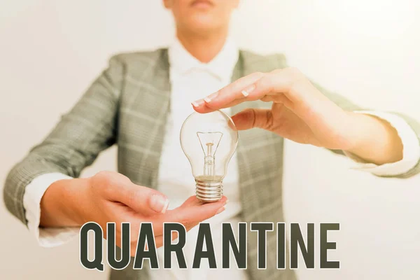 Handwriting text Quarantine. Concept meaning restraint upon the activities of person or the transport of goods Lady in outfit holding lamp with two hands presenting new technology ideas — Foto Stock
