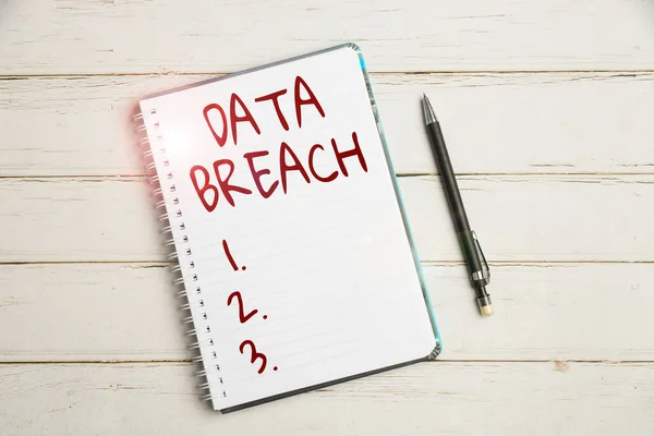 Inspiration showing sign Data Breach. Internet Concept unauthorized release of confidential and secured details Keyboard Over A Table Beside A Notebook And Pens With Sticky Notes — Fotografia de Stock