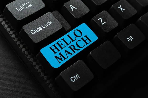 Hello March 'ı gösteren bir tabela. İş kavramı, Mart ayının Soyut Ofis Daktilo İşleri, Daktilo Önemli İş Raporları 'nı karşılarken kullanılan bir karşılama ifadesi — Stok fotoğraf