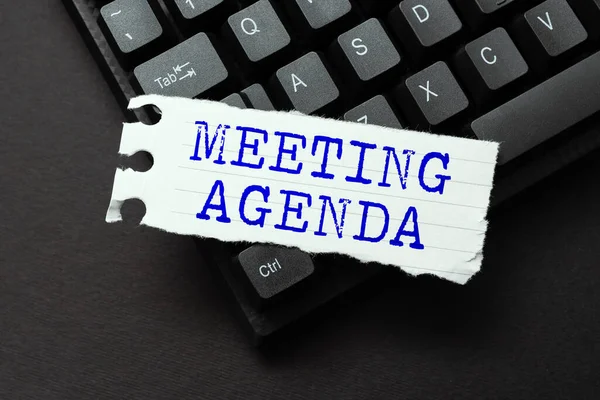 Sign displaying Meeting Agenda. Business approach An agenda sets clear expectations for what needs to a meeting Typing New Educational Textbook, Abstract Retyping Old Essay Online — Stockfoto