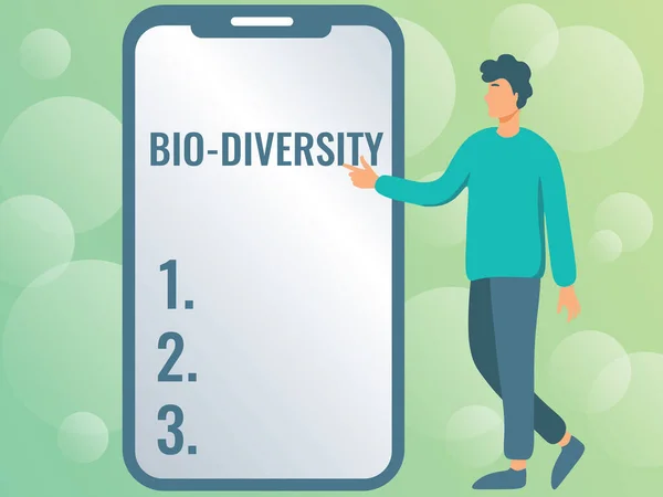 Writing displaying text Bio Diversity. Word Written on Variety of Life Organisms Marine Fauna Ecosystem Habitat Man Drawing Standing Next To A Large Phone Pointing Out Technologies. — Stockfoto