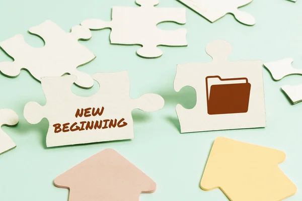 Hand writing sign New Beginning. Business idea Different Career or endeavor Starting again Startup Renew Building An Unfinished White Jigsaw Pattern Puzzle With Missing Last Piece — Fotografia de Stock