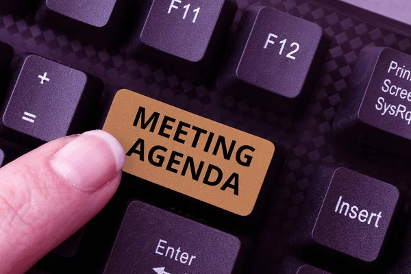 Hand writing sign Meeting Agenda. Business idea An agenda sets clear expectations for what needs to a meeting Typing Device Instruction Manual, Posting Product Review Online