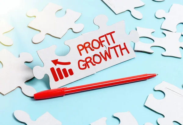 Hand writing sign Profit Growth. Business approach Objectives Interrelation of Overall Sales Market Shares Building An Unfinished White Jigsaw Pattern Puzzle With Missing Last Piece — Foto Stock
