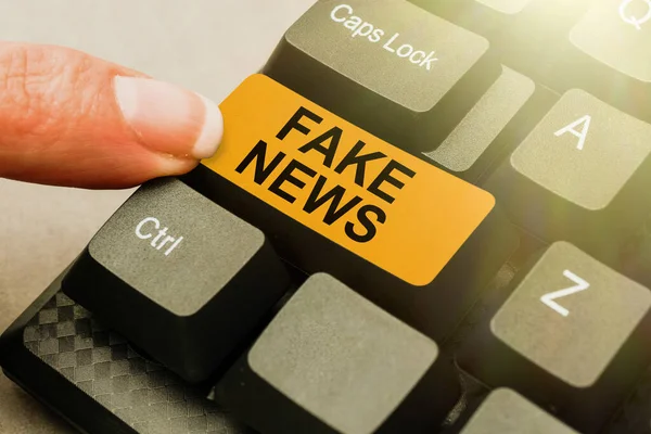 Conceptual display Fake News. Business concept false information publish under the guise of being authentic news Typing Device Instruction Manual, Posting Product Review Online