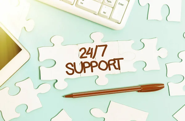 Sign displaying 24 Or 7 Support. Word Written on Giving assistance to service whole day and night No downtime Building An Unfinished White Jigsaw Pattern Puzzle With Missing Last Piece — Stock Photo, Image