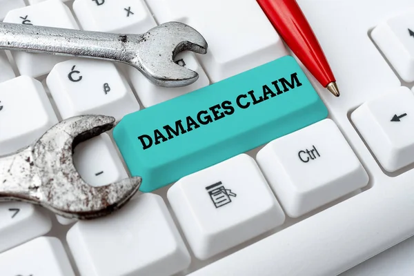 Writing displaying text Damages Claim. Concept meaning Demand Compensation Litigate Insurance File Suit Writing Comments On A Social Media Post, Typing Interesting New Article — Stockfoto