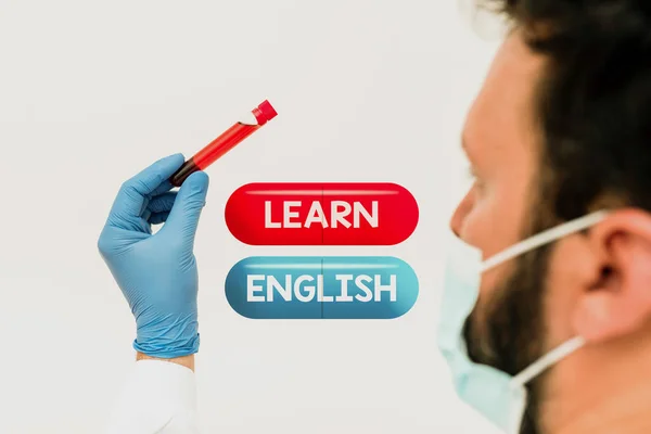 Sign displaying Learn English. Word for Universal Language Easy Communication and Understand Research Scientist Presenting New Medicine, Researching Preventive Measure — Foto Stock