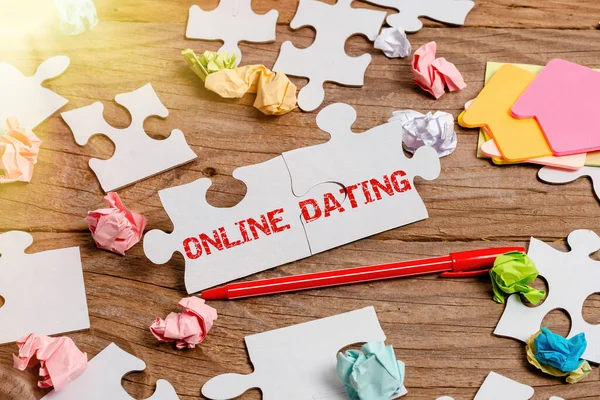 Writing displaying text Online Dating. Business concept Searching Matching Relationships eDating Video Chatting Building An Unfinished White Jigsaw Pattern Puzzle With Missing Last Piece — Stock Photo, Image