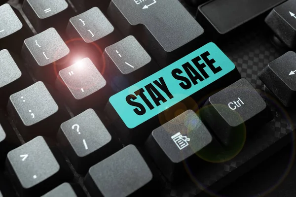 Text sign showing Stay Safe. Conceptual photo secure from threat of danger, harm or place to keep articles Typing New Email Titles Concept, Drafting Internet Article Ideas — стоковое фото