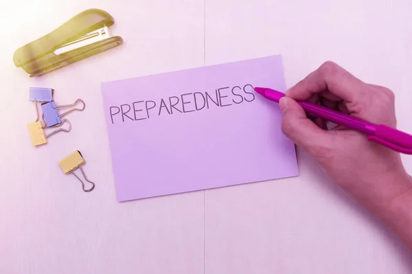 Hand writing sign Preparedness. Word Written on quality or state of being prepared in case of unexpected events Flashy School Office Supplies, Teaching Learning Collections, Writing Tools, — Stockfoto