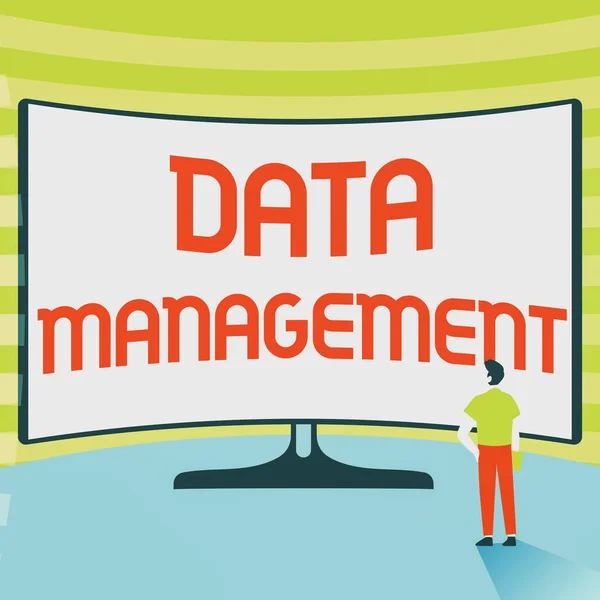 Writing displaying text Data Management. Business concept The practice of organizing and maintaining data processes Man Standing Illustration Standing Infront Of Huge Display Screen. — Foto Stock