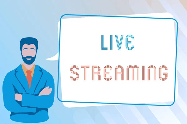 Inspiration showing sign Live Streaming. Business overview Transmit live video coverage of an event over the Internet Man Crossing Hands Illustration Standing With Speech Bubble Message. — стоковое фото