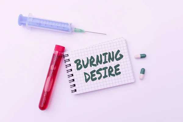 Hand writing sign Burning Desire. Business overview Extremely interested in something Wanted it very much Research Notes For Virus Prevention, Planning Medical Procedures — Fotografia de Stock