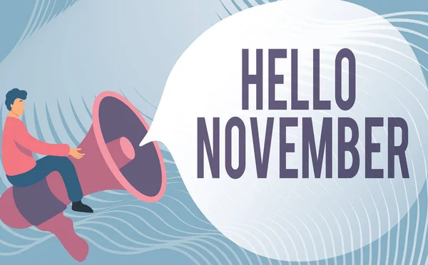 Writing displaying text Hello November. Business overview Welcome the eleventh month of the year Month before December Gentleman Drawing Riding Big Megaphone Showing Speech Bubble. — Stockfoto
