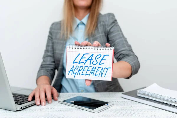 Hand writing sign Lease Agreement. Business approach Contract on the terms to one party agrees rent property Financial Advisor Giving Money Saving Tips, Entrepreneur Discussing Deals — Stock Photo, Image