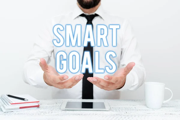 Text sign showing Smart Goals. Word Written on mnemonic used as a basis for setting objectives and direction Presenting Communication Technology Smartphone Voice And Video Calling — Stock Photo, Image